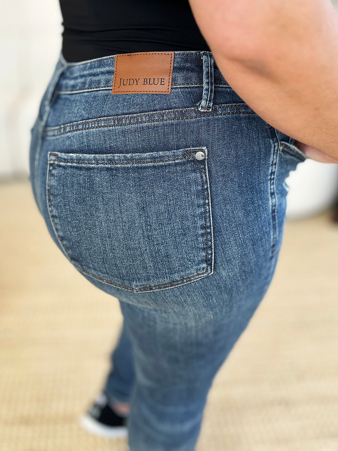 Judy Blue Full Size Mid Waist Distressed Slim Jeans - The Goddess Galleries