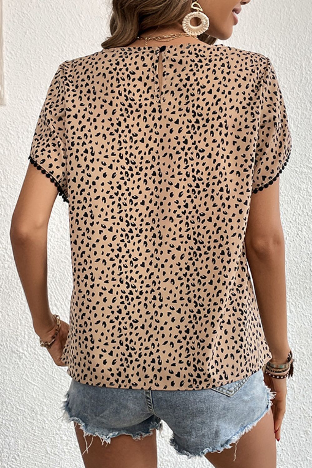 Perfee Printed Pom Pom Detail Petal Sleeve Round Neck Blouse - The Goddess Galleries
