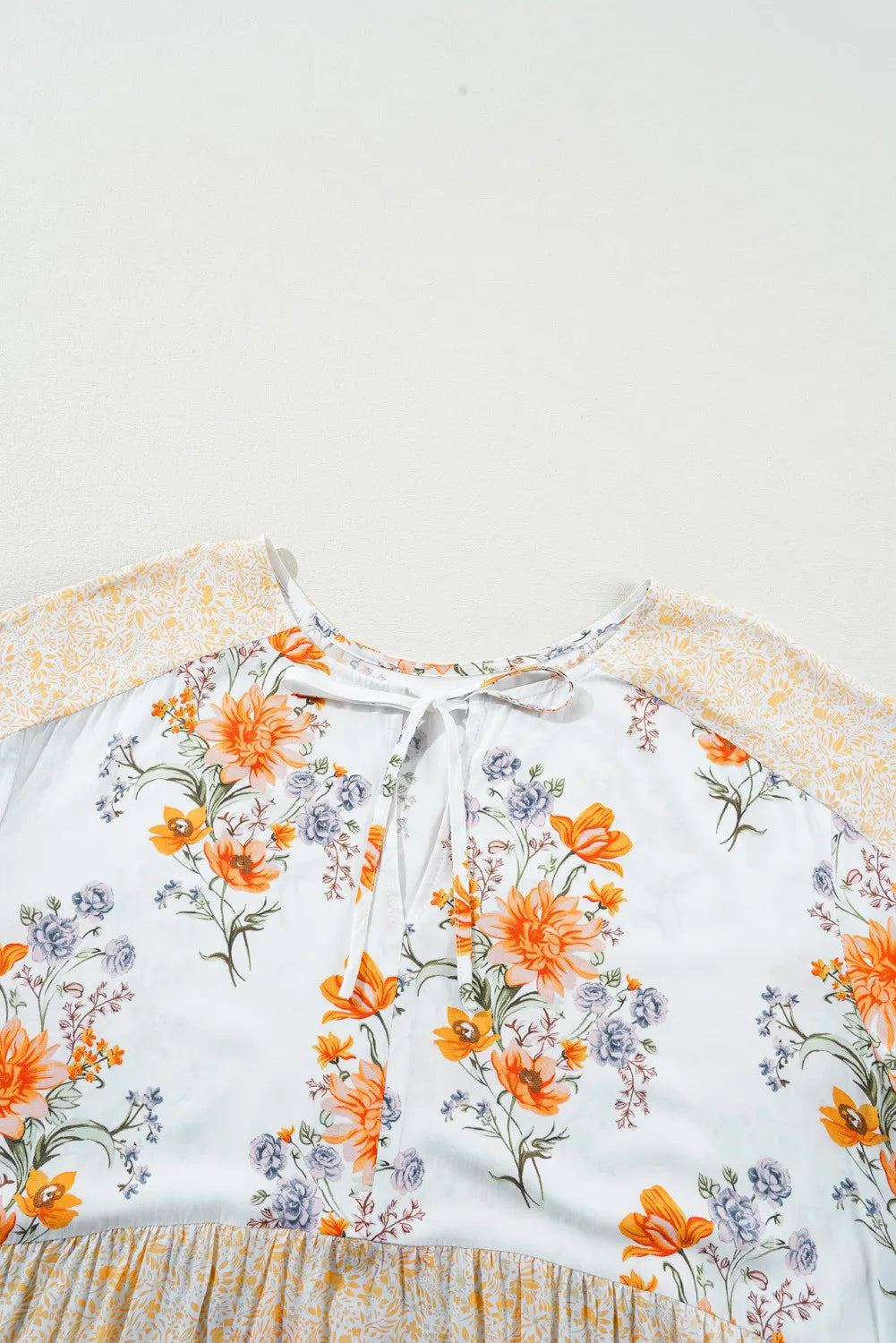 Plus Size Printed Tie Neck Long Sleeve Blouse - The Goddess Galleries