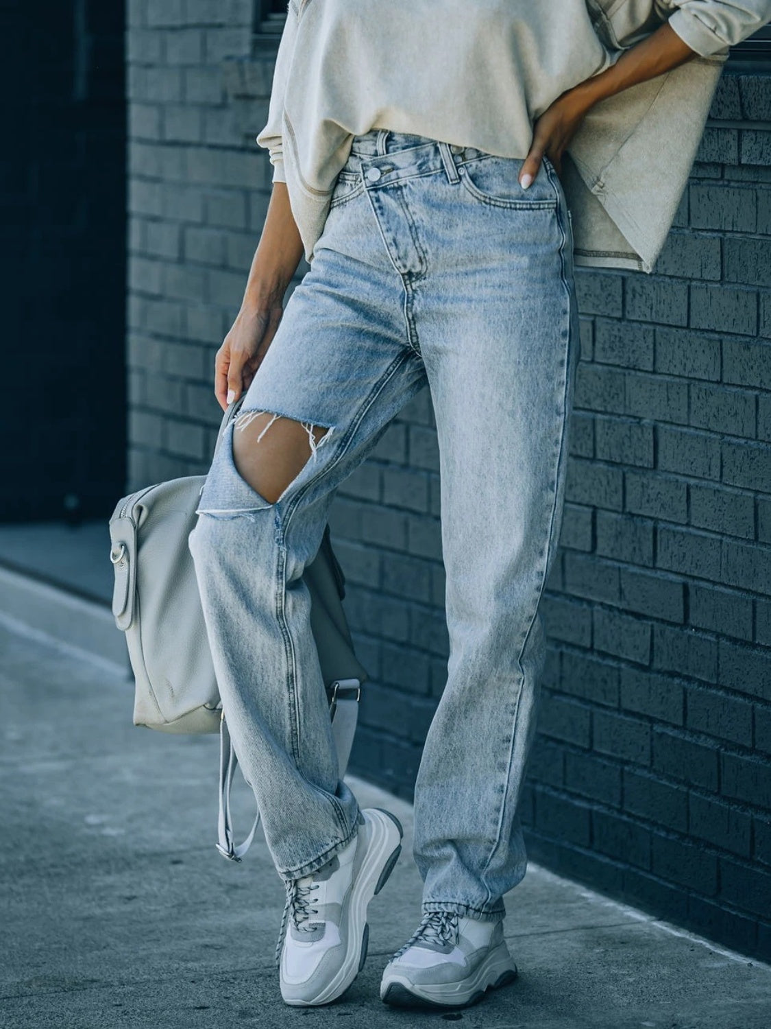 Distressed Asymmetric Waist Jeans - The Goddess Galleries