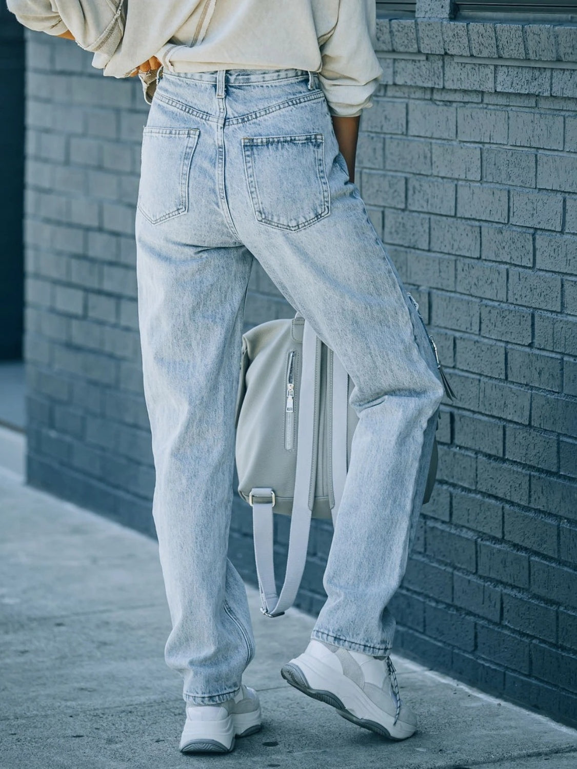 Distressed Asymmetric Waist Jeans - The Goddess Galleries